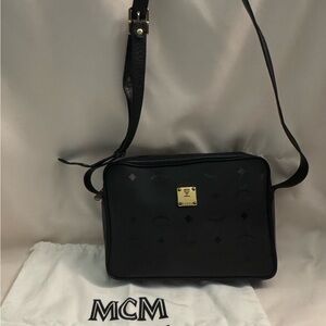 MCM Black Crossbody Bag with Gold Accents